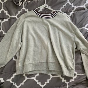 A grey sweater, never worn